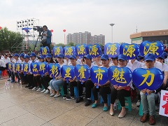 2015年7月參加市里慶?；顒?dòng)